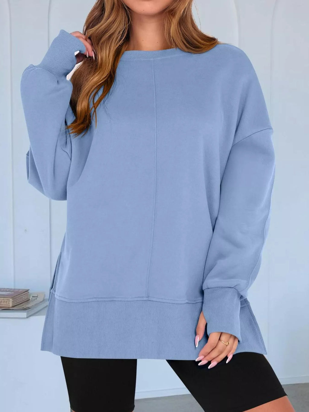 Side Slit Round Neck Long Sleeve Sweatshirt by Trendsi
