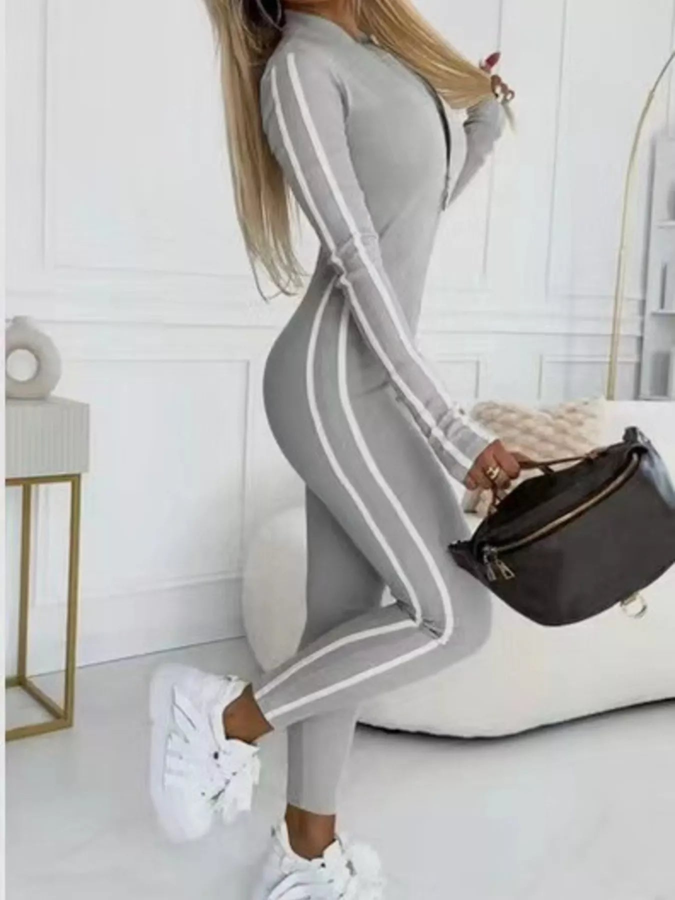 Full Size Stripe Zip-Front Long Sleeve Jumpsuit Plus Size by Trendsi