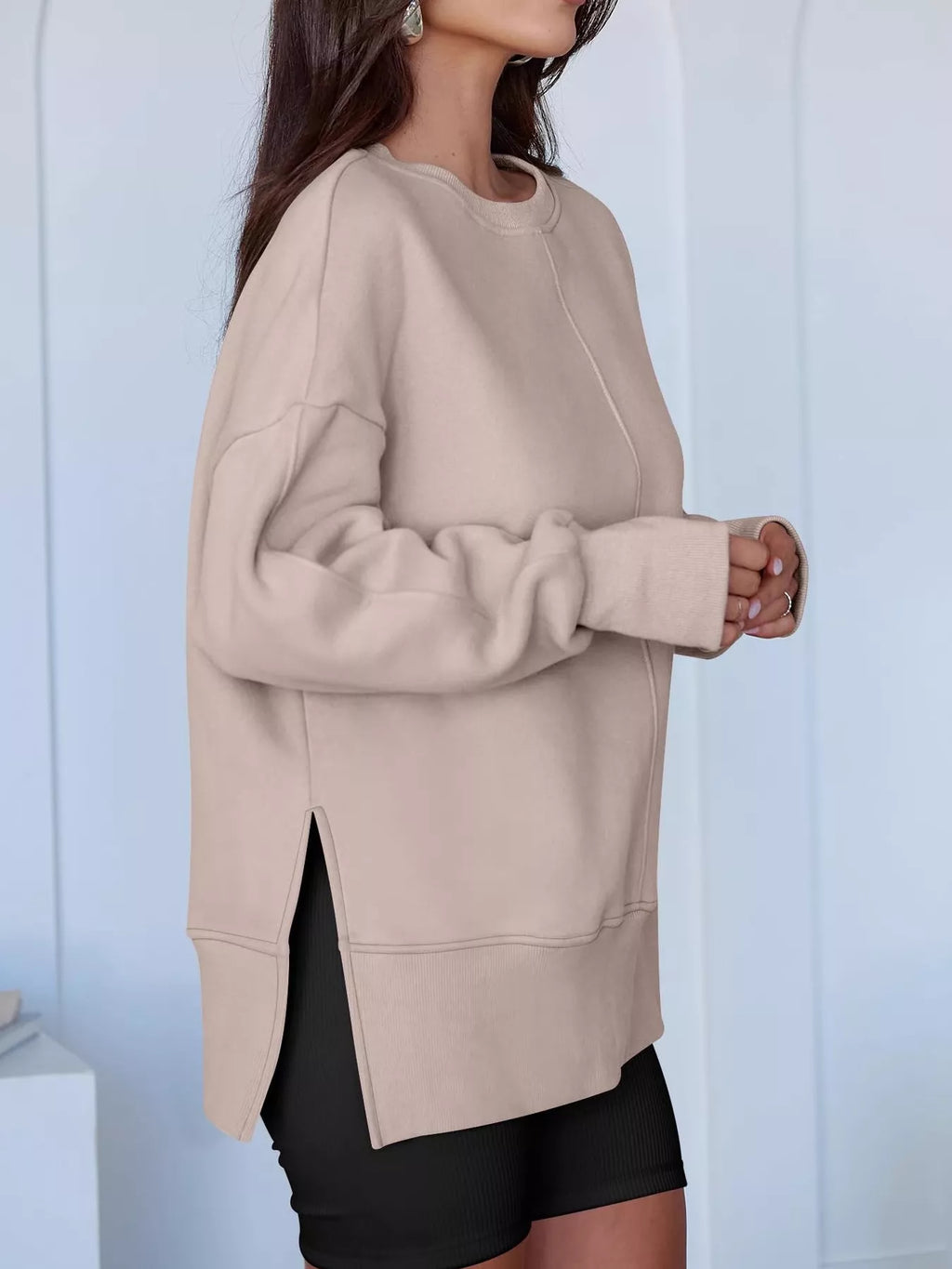 Side Slit Round Neck Long Sleeve Sweatshirt by Trendsi