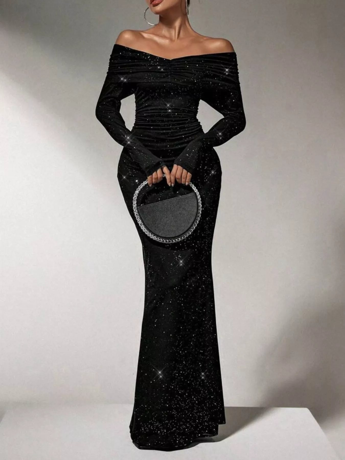 Off-Shoulder Glitter Evening Maxi Dress by Trendsi