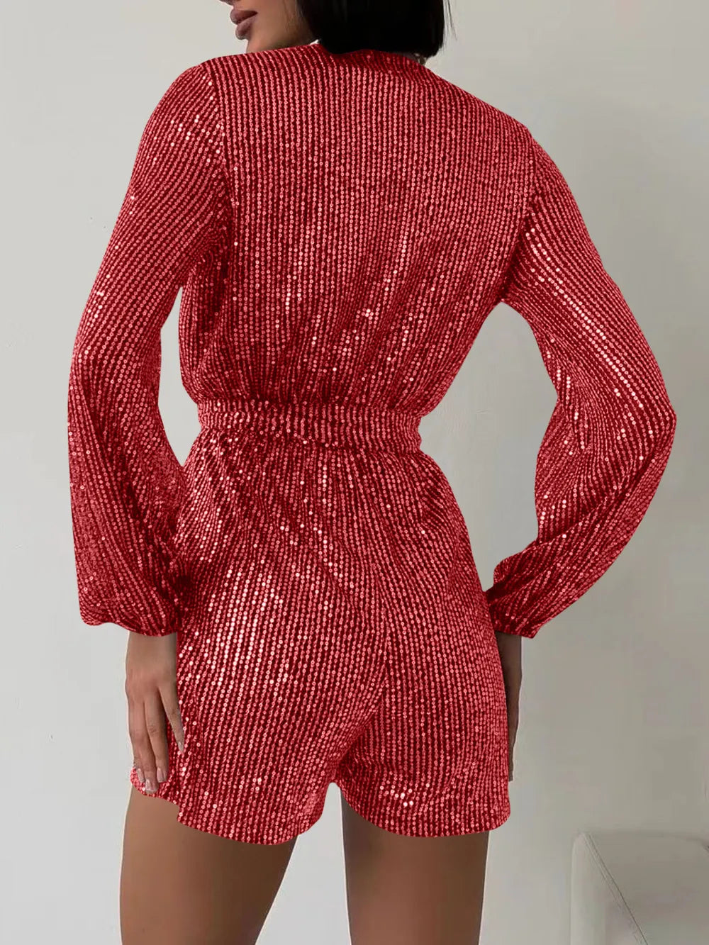 Full Size Sequin Surplice Tie Waist Long Sleeve Romper by Trendsi