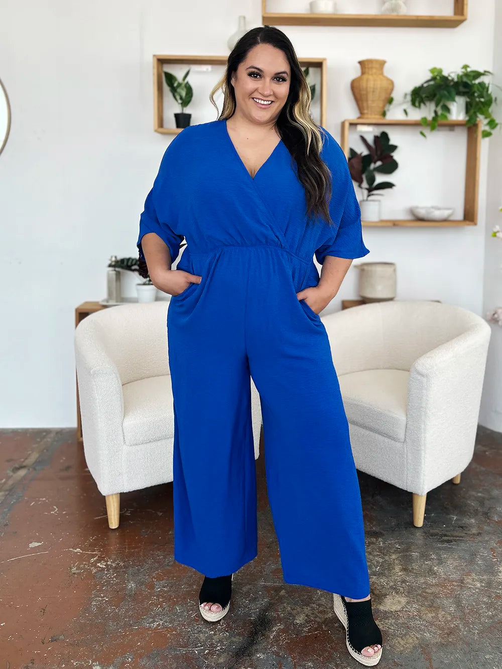 Double Take Full Size Surplice Wide Leg Jumpsuit with Pockets by Trendsi