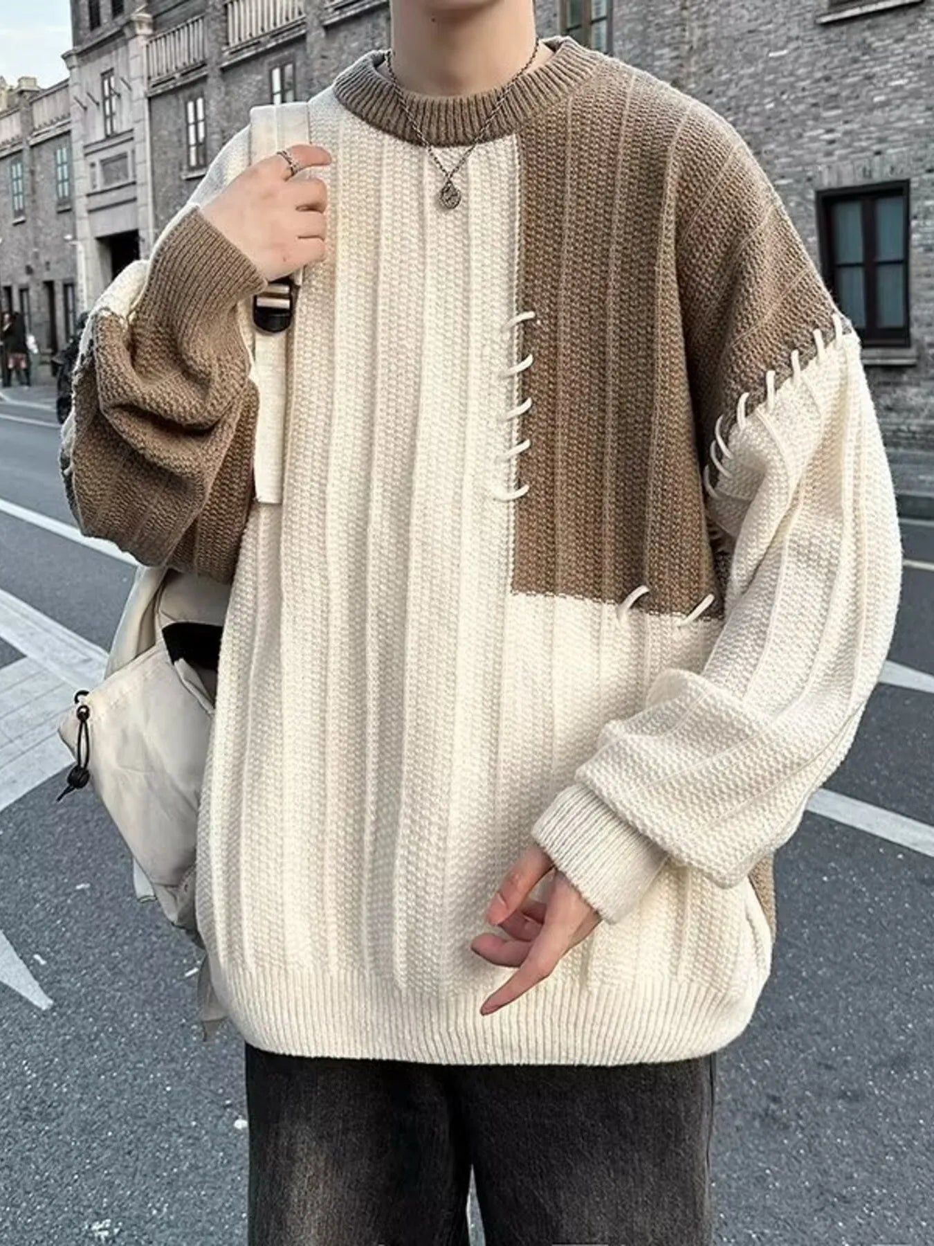 Men's Color Block Round Neck Knitted Pullover by Trendsi