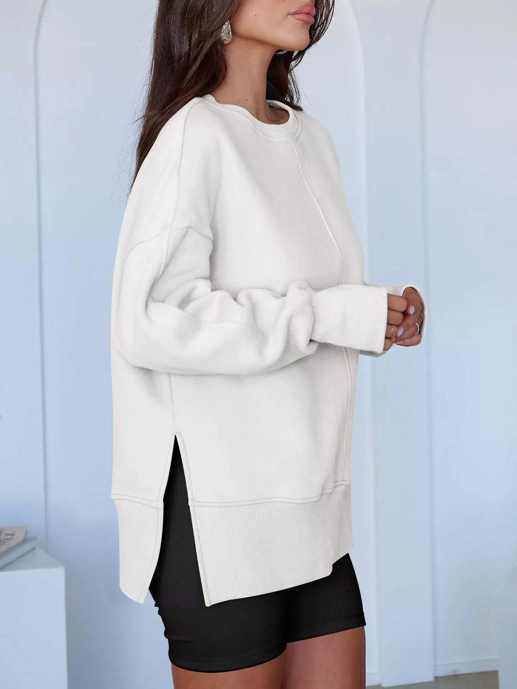Side Slit Round Neck Long Sleeve Sweatshirt by Trendsi