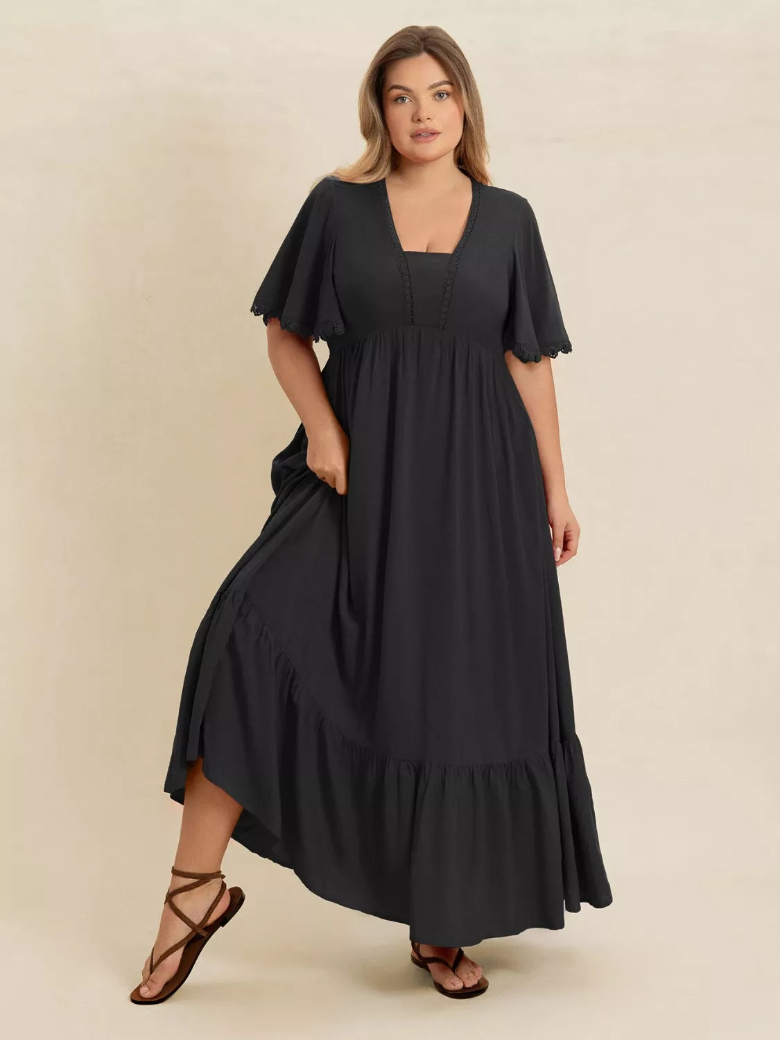 Plus Size Boho Ruffled Maxi Dress with Flutter Sleeves by Trendsi