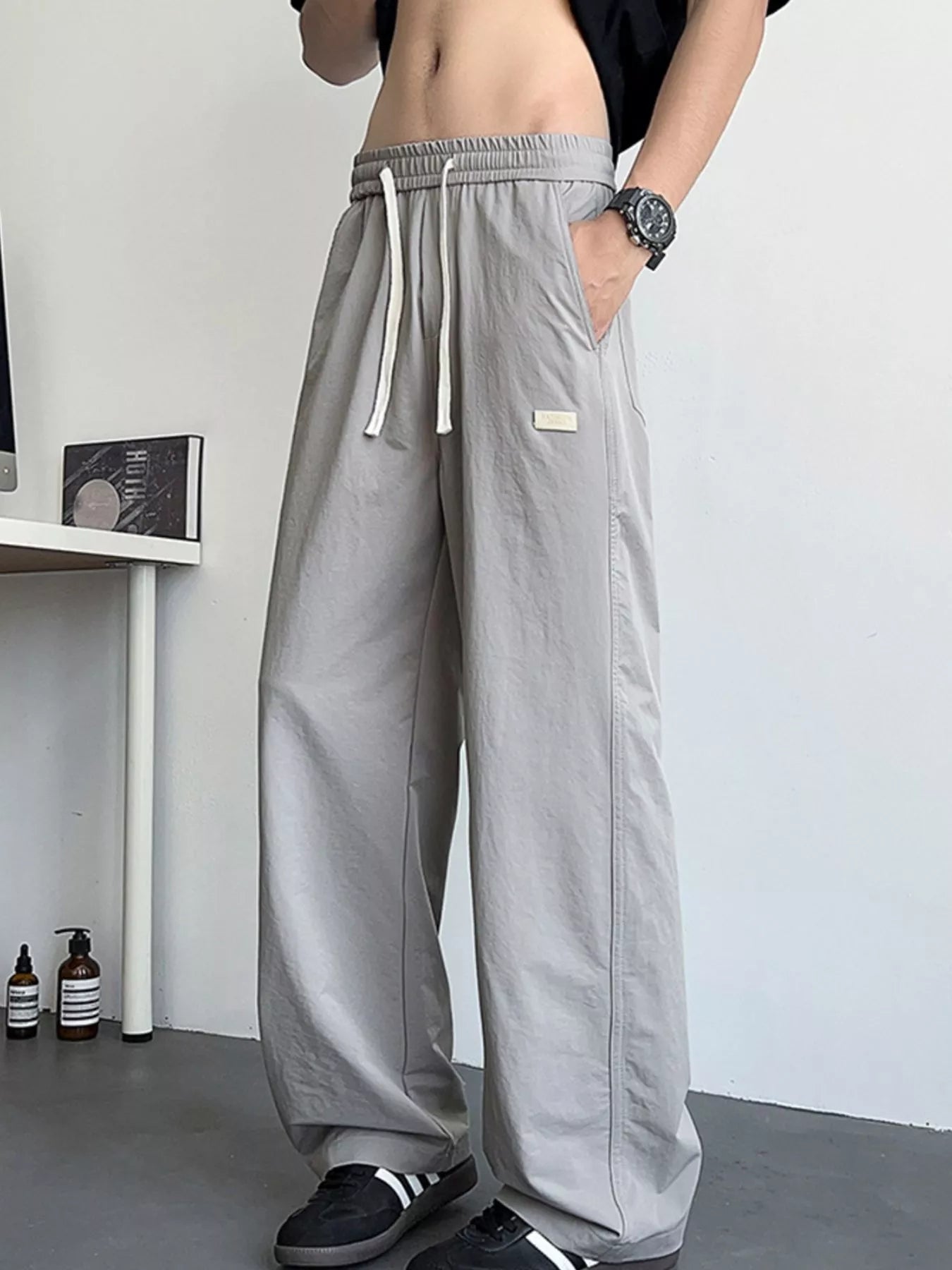 Men's Loose Fit Drawstring Casual Pants by Trendsi