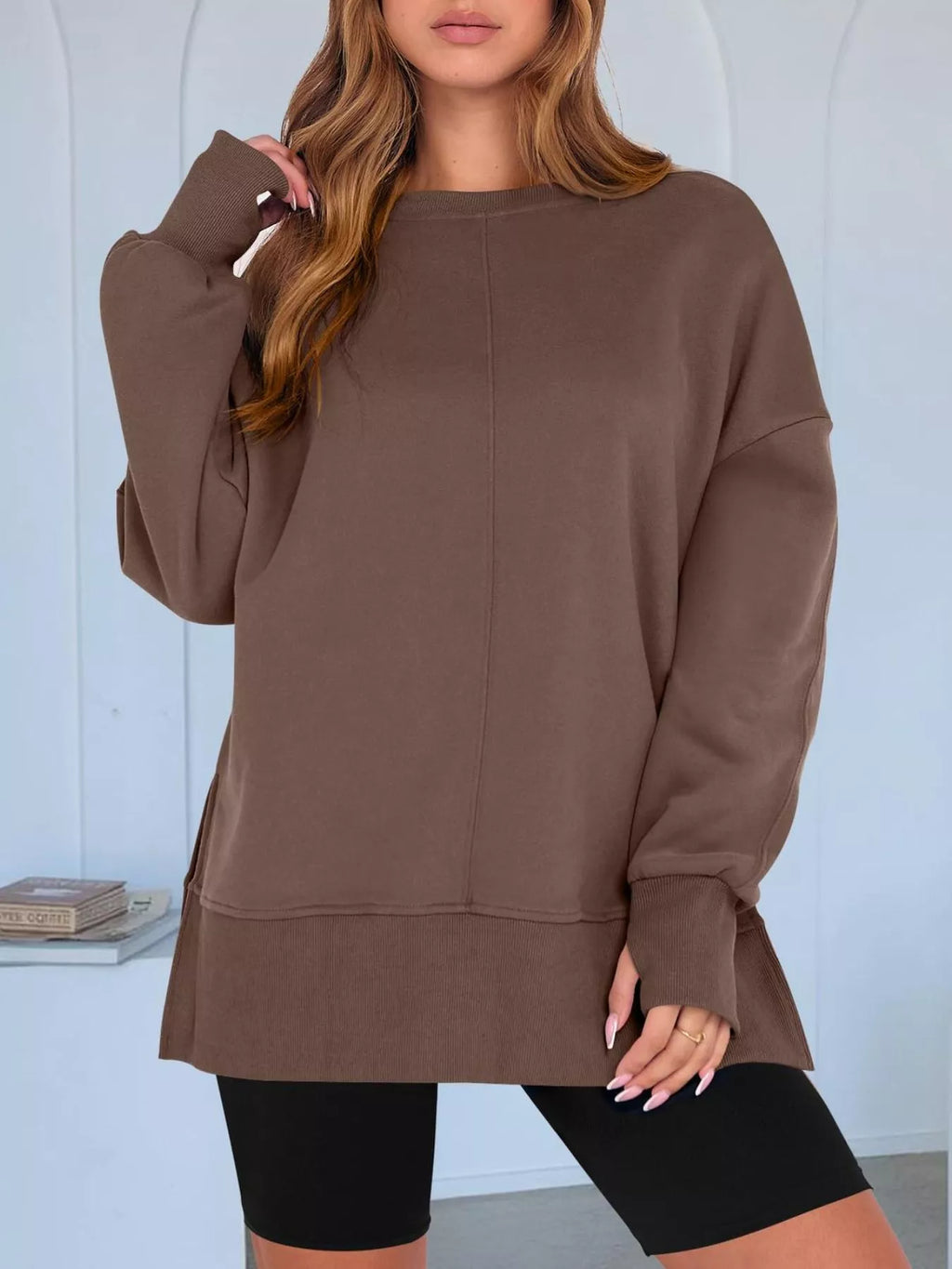 Side Slit Round Neck Long Sleeve Sweatshirt by Trendsi