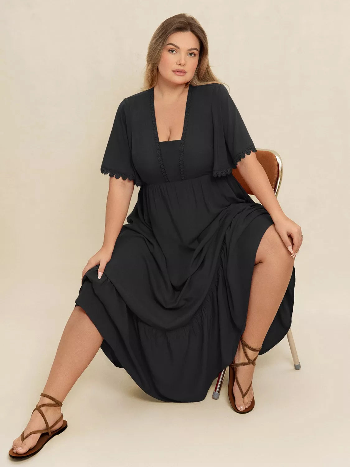 Plus Size Boho Ruffled Maxi Dress with Flutter Sleeves by Trendsi