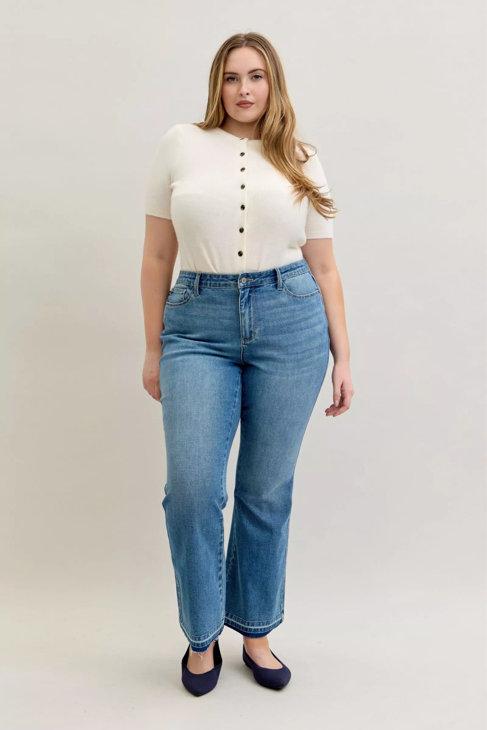 Judy Blue Full Size Mid Rise Slim Bootcut Tummy Control Release Hem Jeans Plus Size by Trendsi