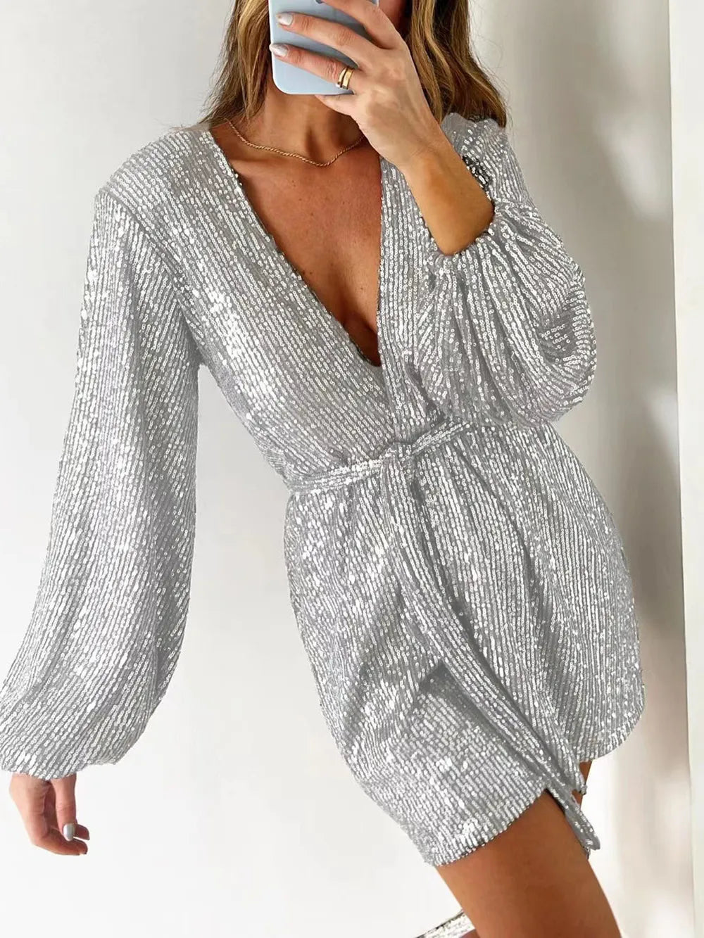 Full Size Sequin Surplice Tie Waist Long Sleeve Romper by Trendsi