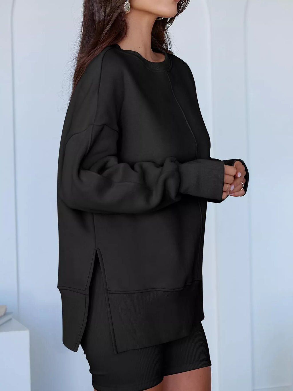 Side Slit Round Neck Long Sleeve Sweatshirt by Trendsi