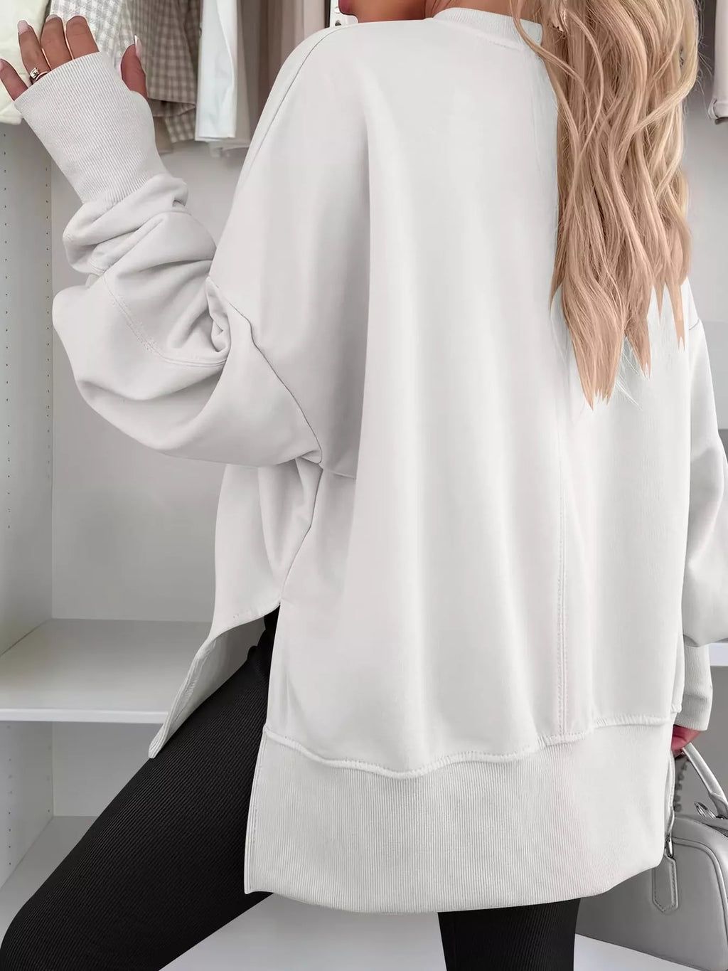 Side Slit Round Neck Long Sleeve Sweatshirt by Trendsi