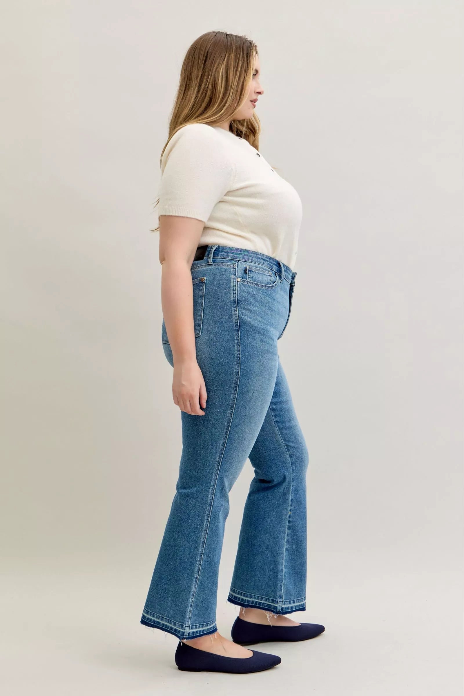 Judy Blue Full Size Mid Rise Slim Bootcut Tummy Control Release Hem Jeans Plus Size by Trendsi