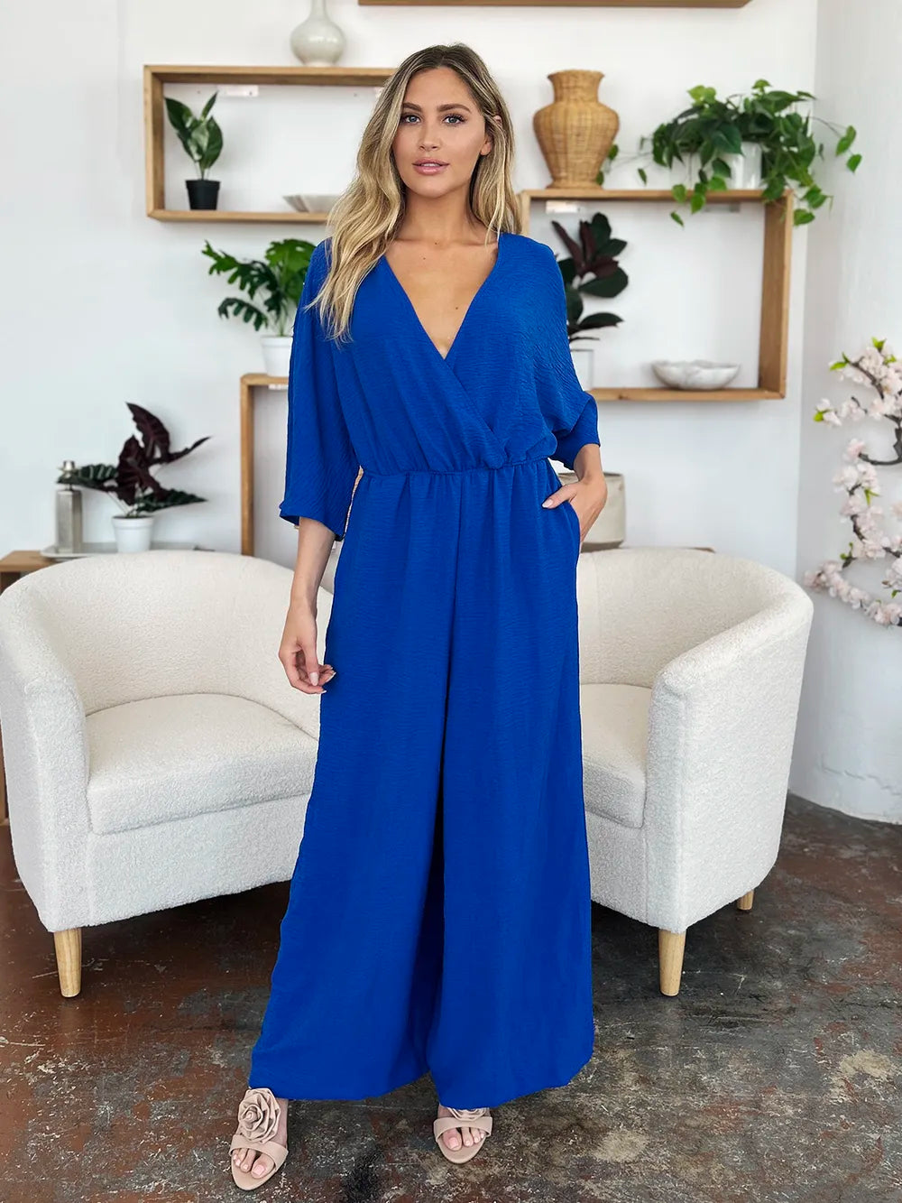Double Take Full Size Surplice Wide Leg Jumpsuit with Pockets by Trendsi