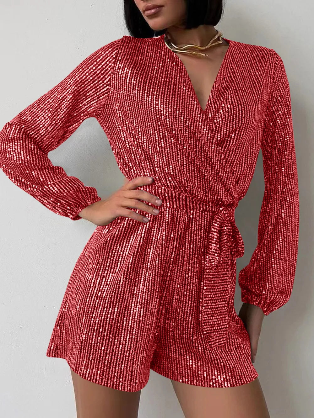 Full Size Sequin Surplice Tie Waist Long Sleeve Romper by Trendsi