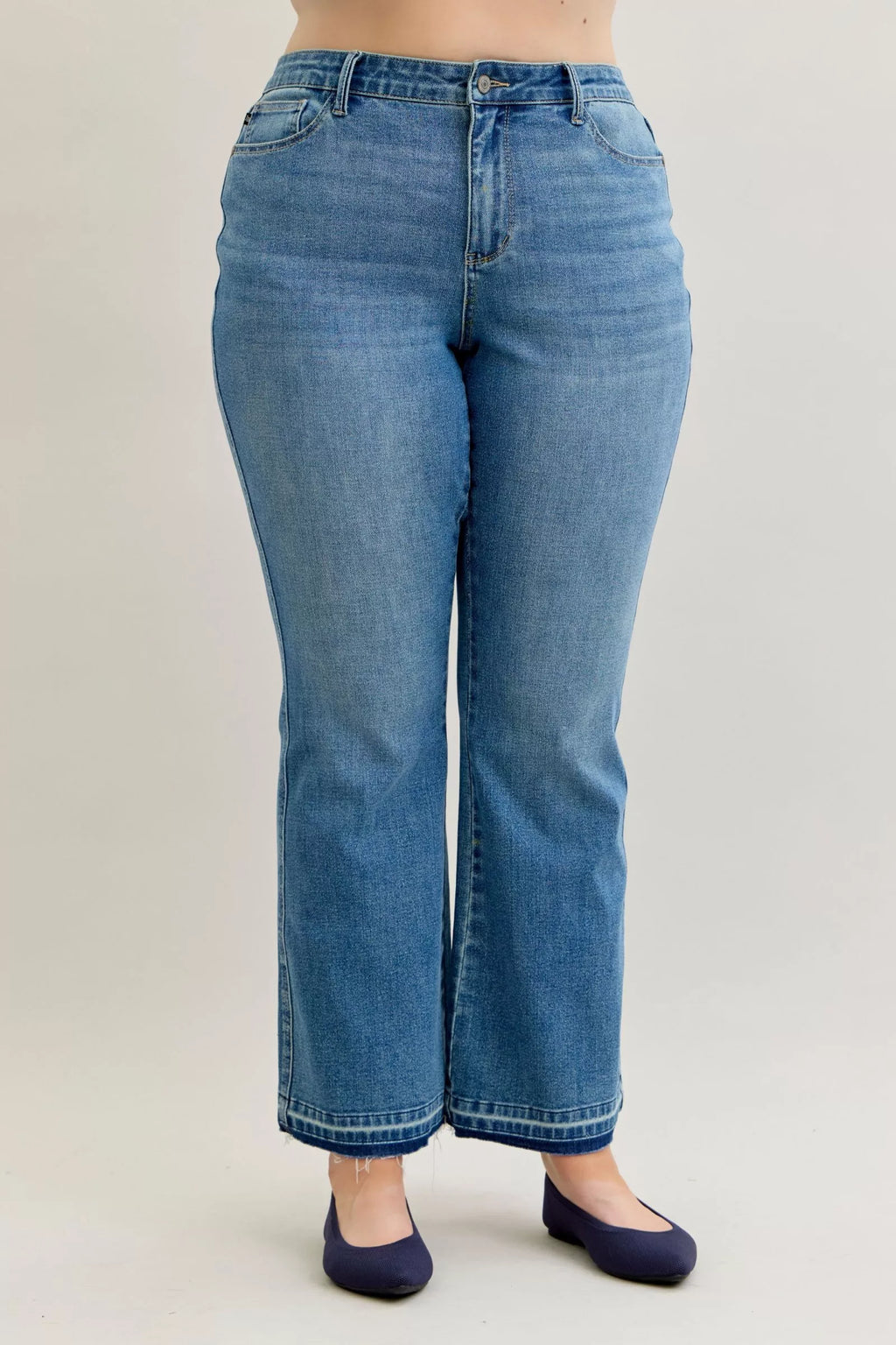 Judy Blue Full Size Mid Rise Slim Bootcut Tummy Control Release Hem Jeans Plus Size by Trendsi