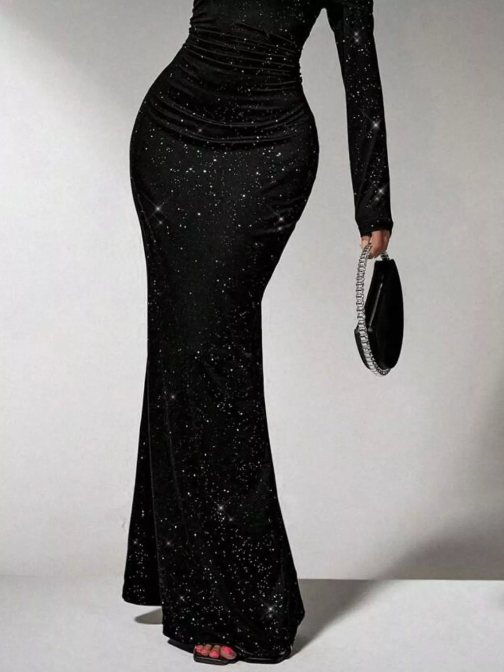 Off-Shoulder Glitter Evening Maxi Dress by Trendsi