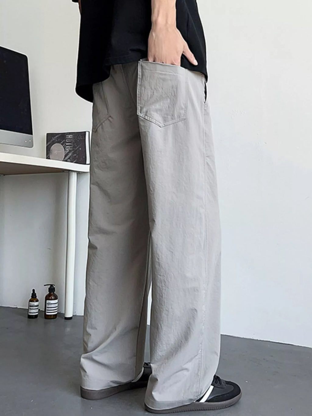 Men's Loose Fit Drawstring Casual Pants by Trendsi