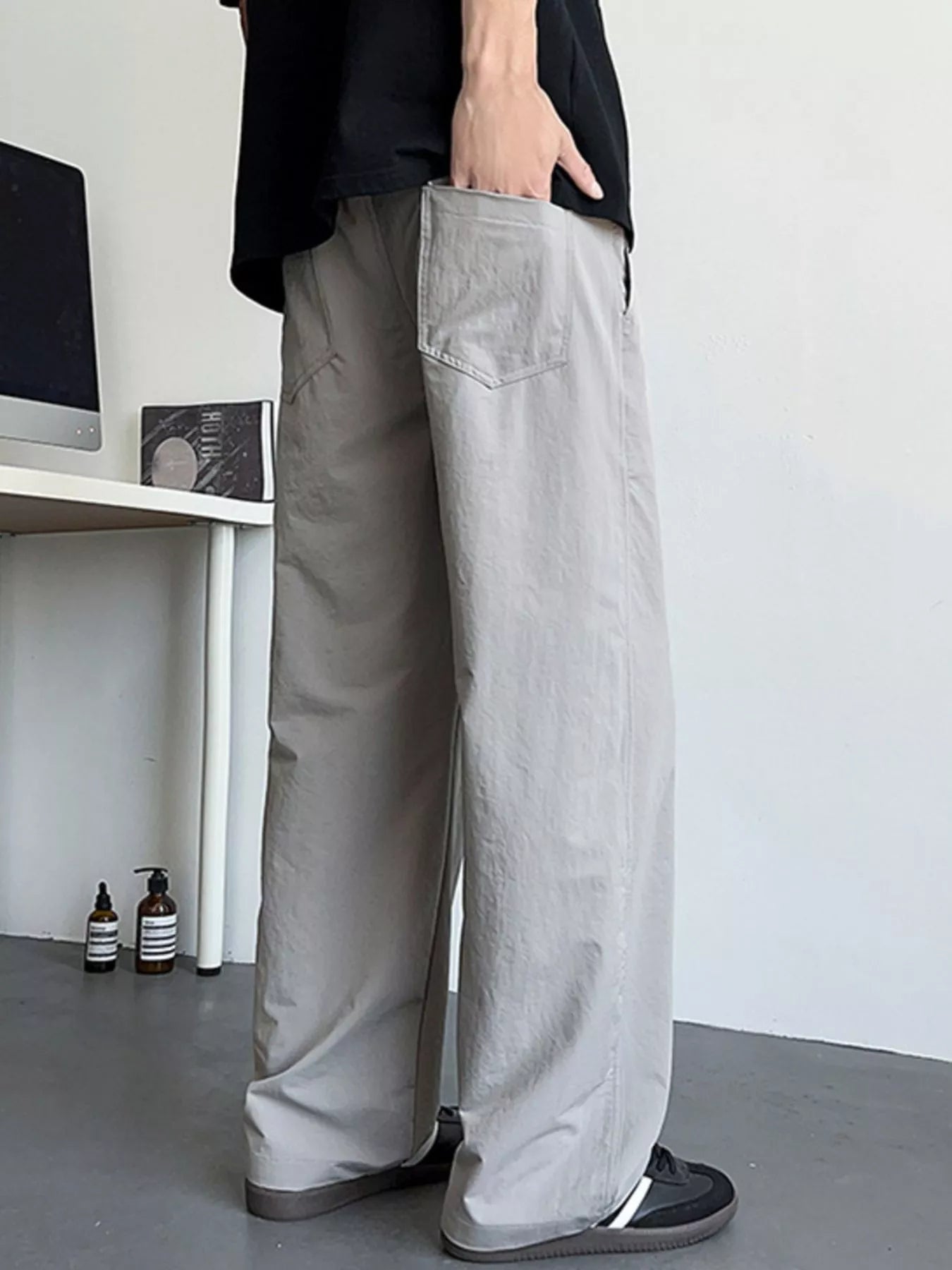 Men's Loose Fit Drawstring Casual Pants by Trendsi