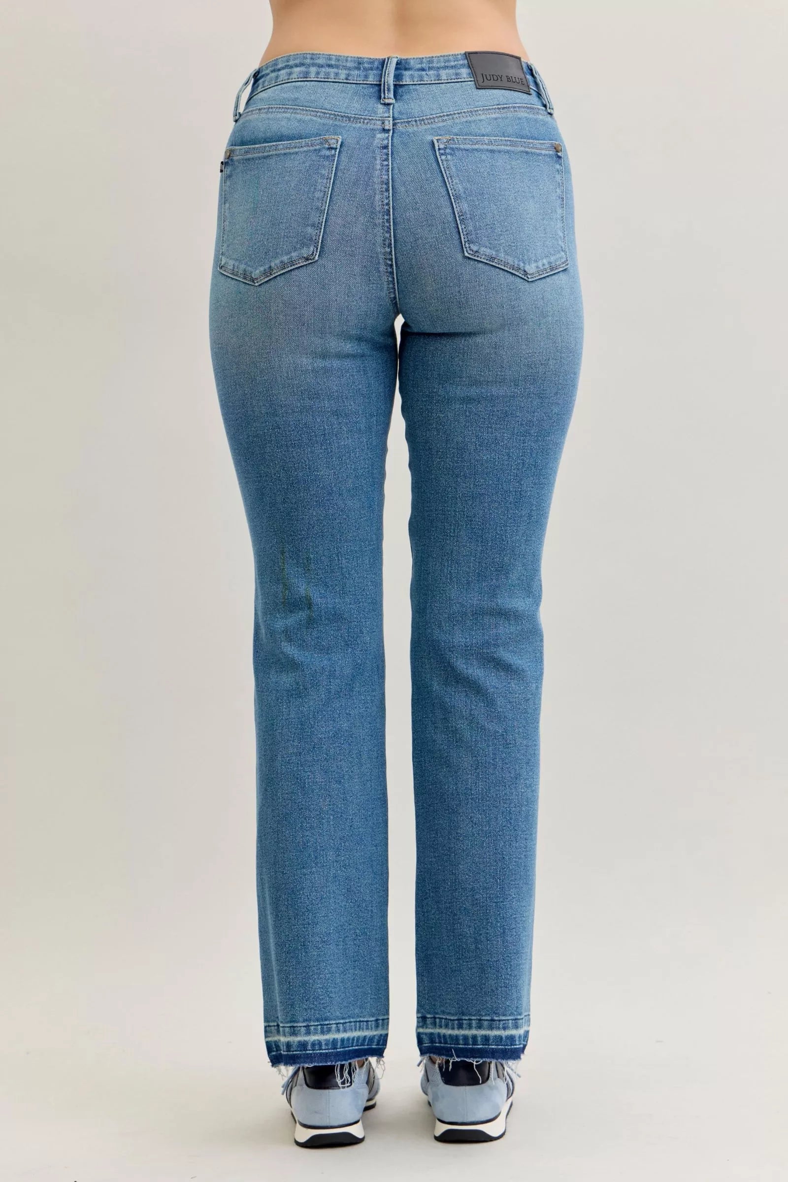 Judy Blue Full Size Mid Rise Slim Bootcut Tummy Control Release Hem Jeans Plus Size by Trendsi