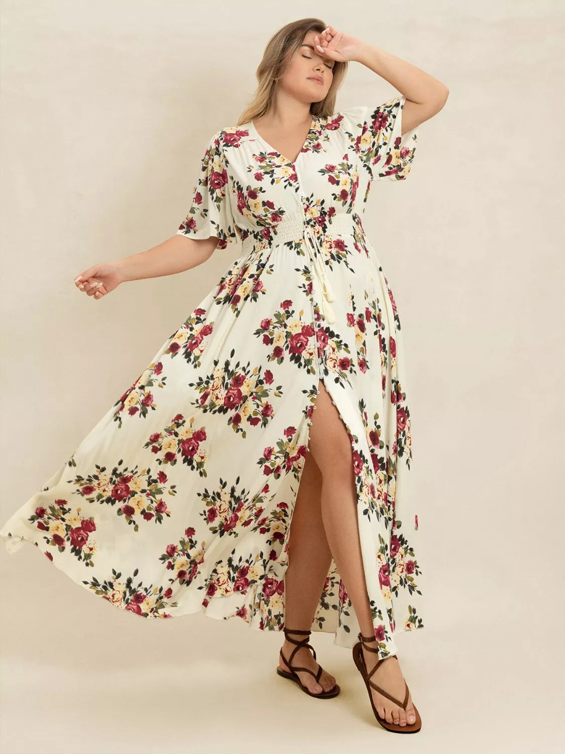 Plus Size Floral Flutter Sleeve Maxi Dress with Button Front by Trendsi