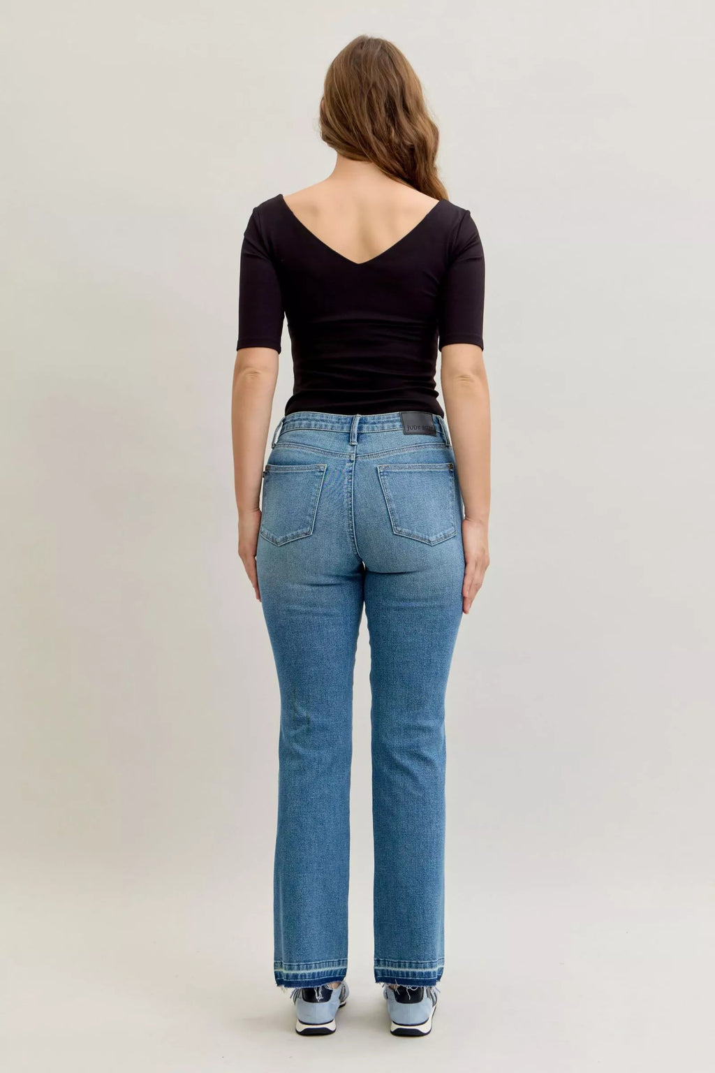 Judy Blue Full Size Mid Rise Slim Bootcut Tummy Control Release Hem Jeans Plus Size by Trendsi