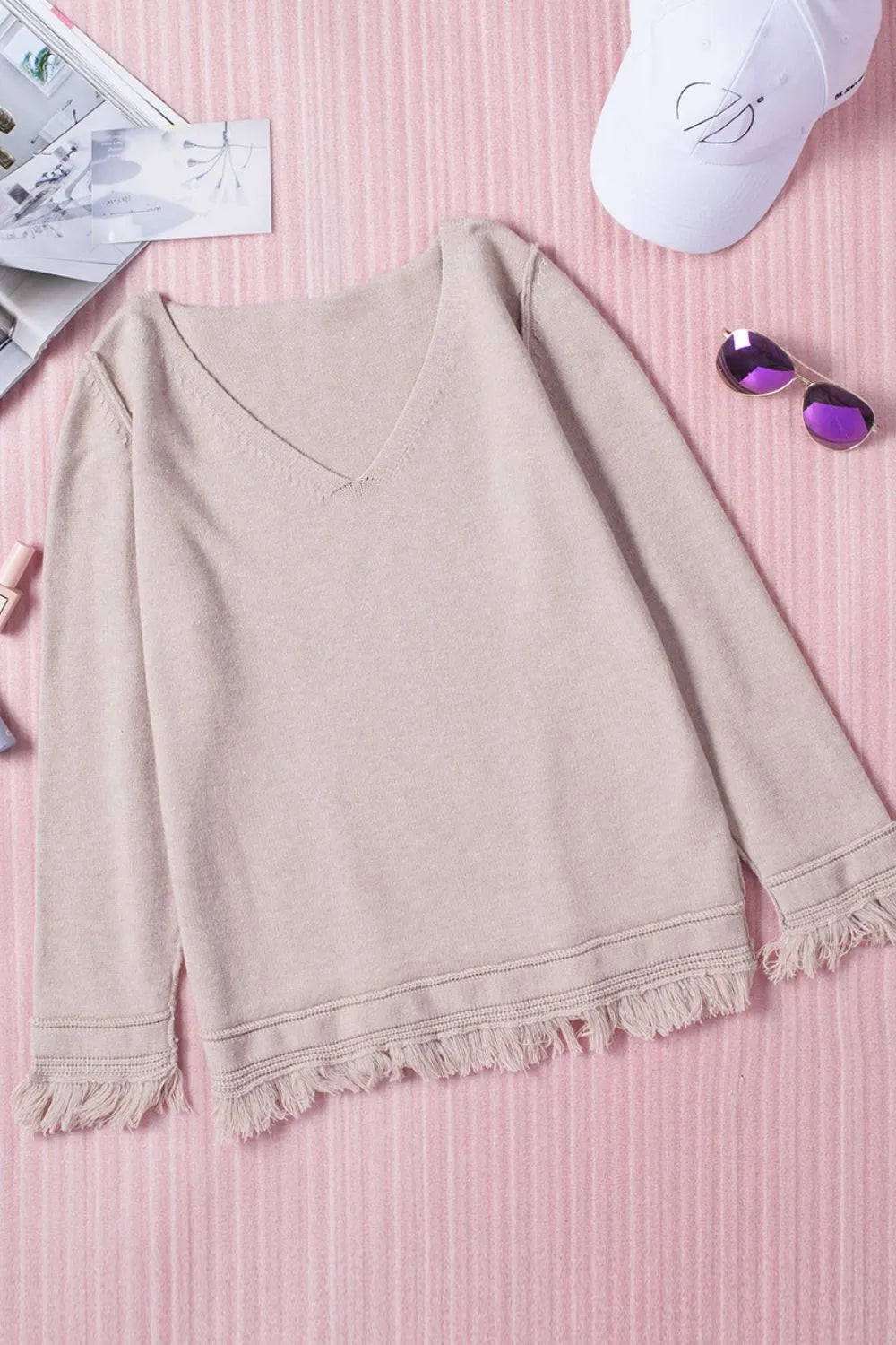 Exposed Seam Fringe Hem V-Neck Long Sleeve Sweater by Trendsi