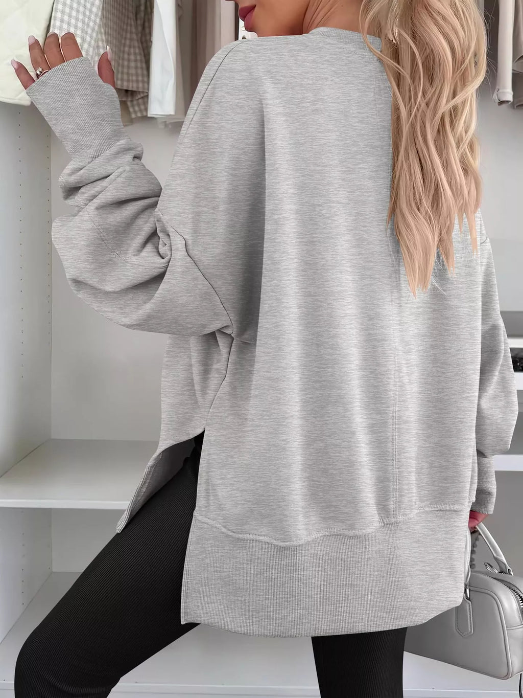 Side Slit Round Neck Long Sleeve Sweatshirt by Trendsi