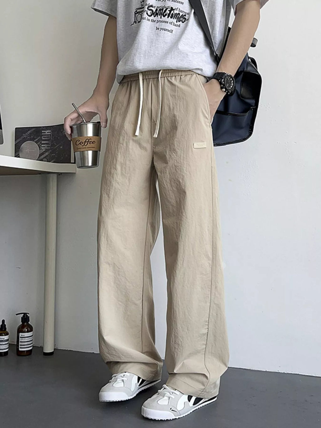 Men's Loose Fit Drawstring Casual Pants by Trendsi